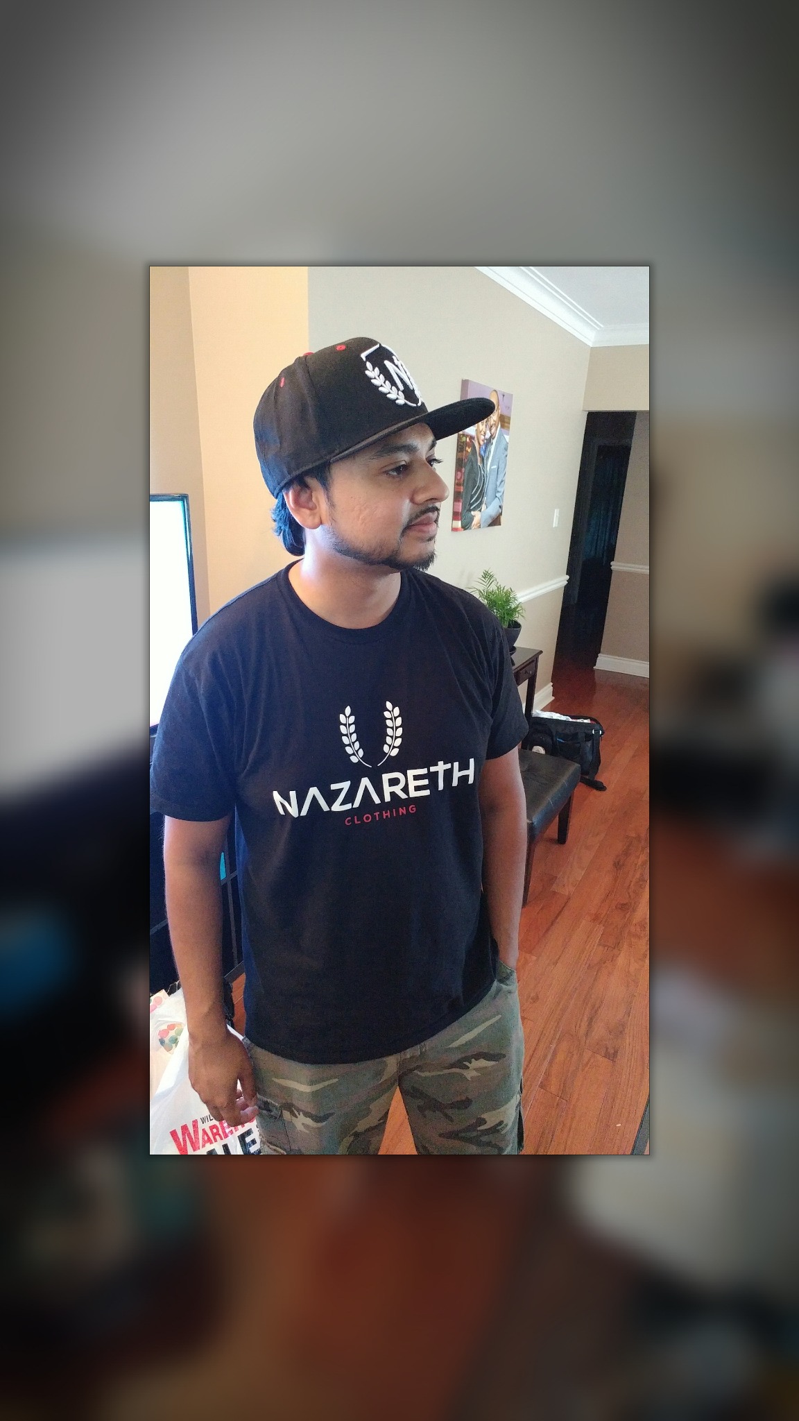 Model in Nazareth Clothing shirt