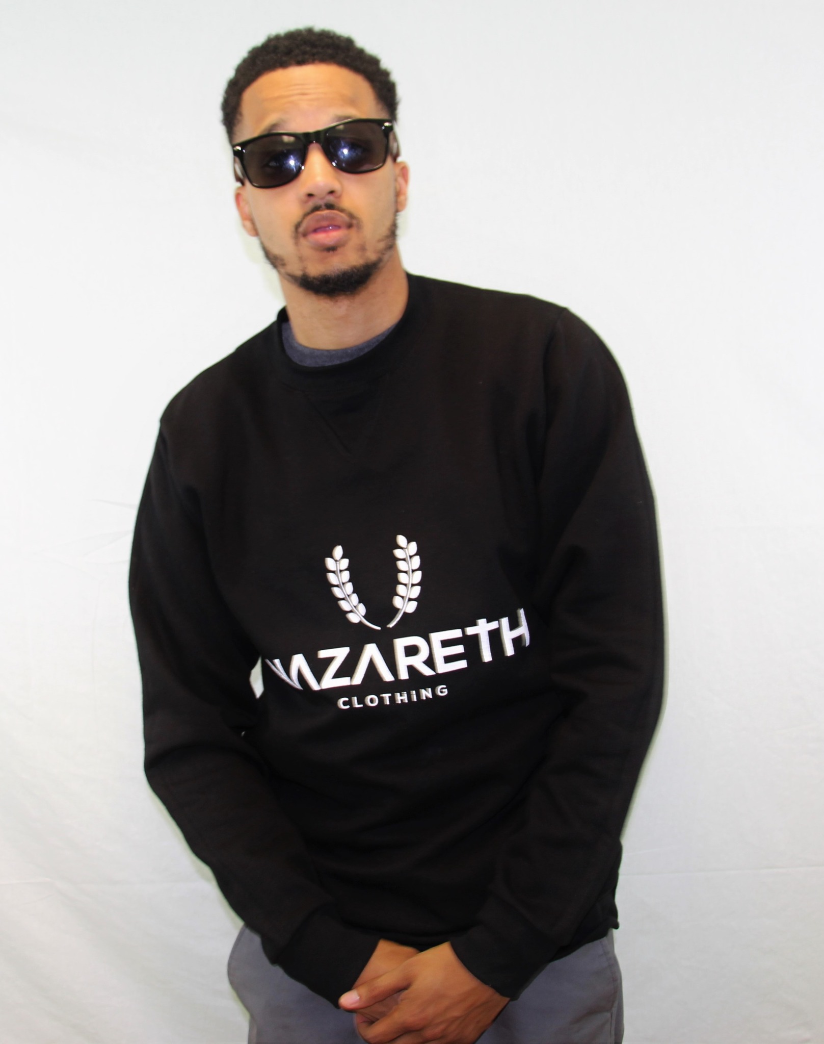 Model in Nazareth Clothing sweatshirt